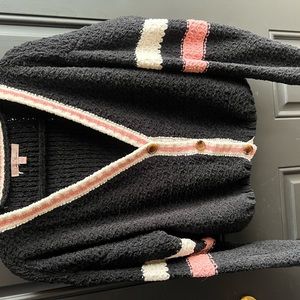 Black fuzzy sweater with color block